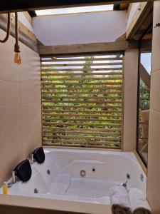 Ein Badezimmer in der Unterkunft Glamping Entrearboles - Bellavista