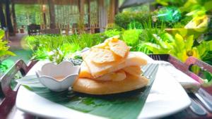 a plate of food sitting on a table at Khaosok River Camp in Khao Sok National Park