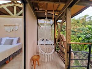 Ein Balkon oder eine Terrasse in der Unterkunft Glamping Entrearboles - Bellavista