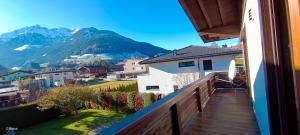 a balcony with a view of the mountains at LTR-Apartment in Mittersill