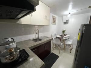 Kuchyň nebo kuchyňský kout v ubytování La Colmena Bauan - Self Catering Townhouse Accommodation