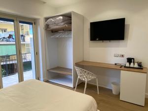 Postel nebo postele na pokoji v ubytování B&B MoMi Sorrento
