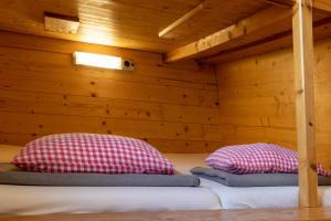 Letto o letti in una camera di Skihütte Zams