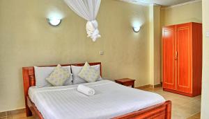 Postel nebo postele na pokoji v ubytování Itibo Resort