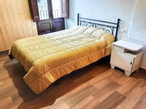 מיטה או מיטות בחדר ב-Cal Magí Casa de ubicación ideal en el Pirineo