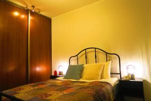 Posteľ alebo postele v izbe v ubytovaní Apartament Geneva