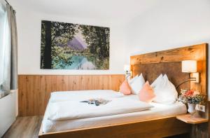 Postel nebo postele na pokoji v ubytování PEOPLE'S Hotel