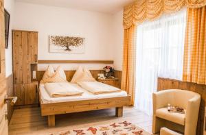 Postel nebo postele na pokoji v ubytování PEOPLE'S Hotel