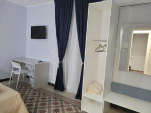TV a/nebo společenská místnost v ubytování B&B Leon + 8 fotografií