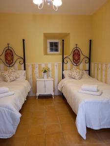 Posteľ alebo postele v izbe v ubytovaní Casa Rural Las Raíces, Sierra de San Vicente