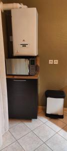 Kuchyňa alebo kuchynka v ubytovaní Charmant Appartement au Cœur de Fougères