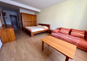Posteľ alebo postele v izbe v ubytovaní Horský hotel Paprsek
