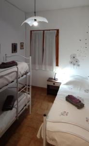 Poschodová posteľ alebo postele v izbe v ubytovaní Casa Matilde - Pinarella