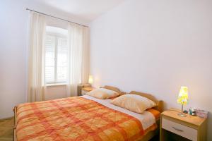 Postel nebo postele na pokoji v ubytování Villa Bona Dubrovnik