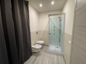 Ett badrum på Rent room Iacopo