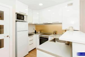 Kuchyňa alebo kuchynka v ubytovaní Mediterranean Barcelona Apartments