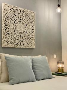 A bed or beds in a room at La Latina Market - Apartamento de 2 dormitorios