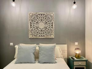 A bed or beds in a room at La Latina Market - Apartamento de 2 dormitorios
