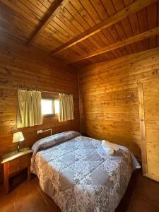 Postel nebo postele na pokoji v ubytování Cabañas Cortijo el Helao