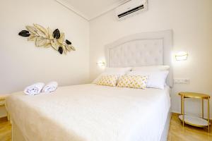 Posteľ alebo postele v izbe v ubytovaní Holiday Penthouse San Miguel 5-7