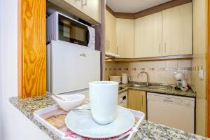 Kuchyňa alebo kuchynka v ubytovaní Holiday Penthouse San Miguel 5-7