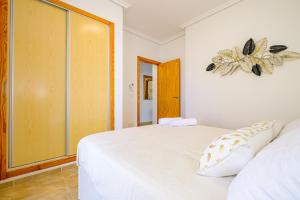 Posteľ alebo postele v izbe v ubytovaní Holiday Penthouse San Miguel 5-7