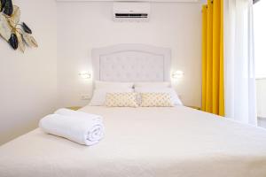 Posteľ alebo postele v izbe v ubytovaní Holiday Penthouse San Miguel 5-7