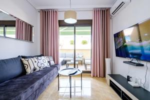 Televízia a/alebo spoločenská miestnosť v ubytovaní Holiday Penthouse San Miguel 5-7
