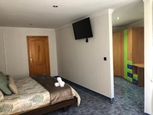 A television and/or entertainment centre at 110 square meters, 5 min of all-Best area of Las Palmas