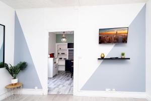 Kuchyňa alebo kuchynka v ubytovaní LD-Location Hôtel