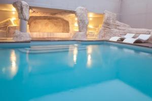 
The swimming pool at or near Royal Ours Blanc Boutique Hôtel & Spa
