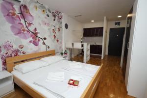 Postel nebo postele na pokoji v ubytování Apartman Dana