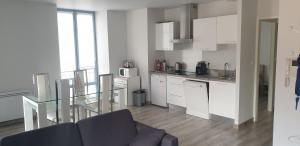 Kuchyňa alebo kuchynka v ubytovaní Appartement T2 45 m² en centre-ville