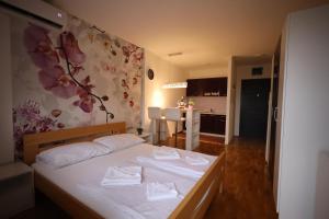 Letto o letti in una camera di Apartman Dana