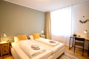 Ένα ή περισσότερα κρεβάτια σε δωμάτιο στο 4-Room Luxury Apartment - close to Central Station, free parking, kitchen