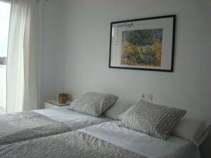 Ένα ή περισσότερα κρεβάτια σε δωμάτιο στο Casa Aina +31 φωτογραφίες