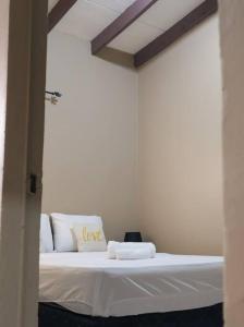 Uma cama ou camas num quarto em Casco histórico Demeter