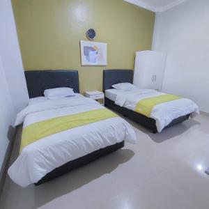 Postel nebo postele na pokoji v ubytování TM 16 Padang, Near Mentawai Fast & City Center