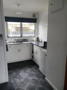 Kuchyň nebo kuchyňský kout v ubytování Brooklyne Motel Sanson