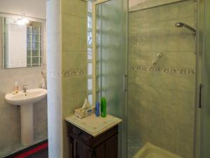 a bathroom with a shower and a sink at Tra Gli Ulivi in Pietra Ligure +58 photos