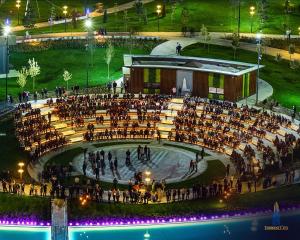 an overhead view of a large amphitheater with a crowd of people at Finsbury in Tashkent