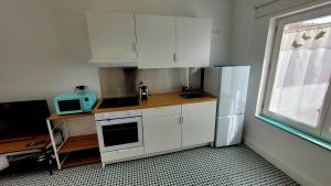Kuchyň nebo kuchyňský kout v ubytování Casa Tina