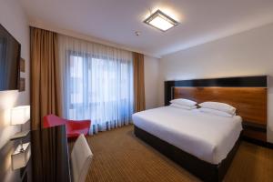 Letto o letti in una camera di Grand Majestic Hotel Prague