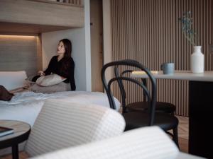 Cama ou camas em um quarto em fav HIROSHIMA HEIWAODORI