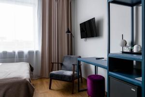 Narva Hotell & Spaa的电视和/或娱乐中心
