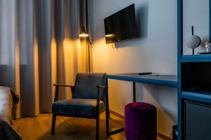 Narva Hotell & Spaa的电视和/或娱乐中心