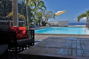 Πισίνα στο ή κοντά στο Vue exceptionnelle sur le lagon, sunsets magiques - Isleda Villas - 5*