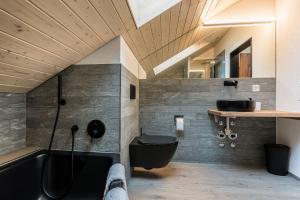 Koupelna v ubytování Melchtal Resort Apart Hotel