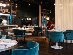 Reštaurácia alebo iné gastronomické zariadenie v ubytovaní Mercure Hôtel Le Touquet
