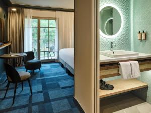 Posteľ alebo postele v izbe v ubytovaní Mercure Hôtel Le Touquet